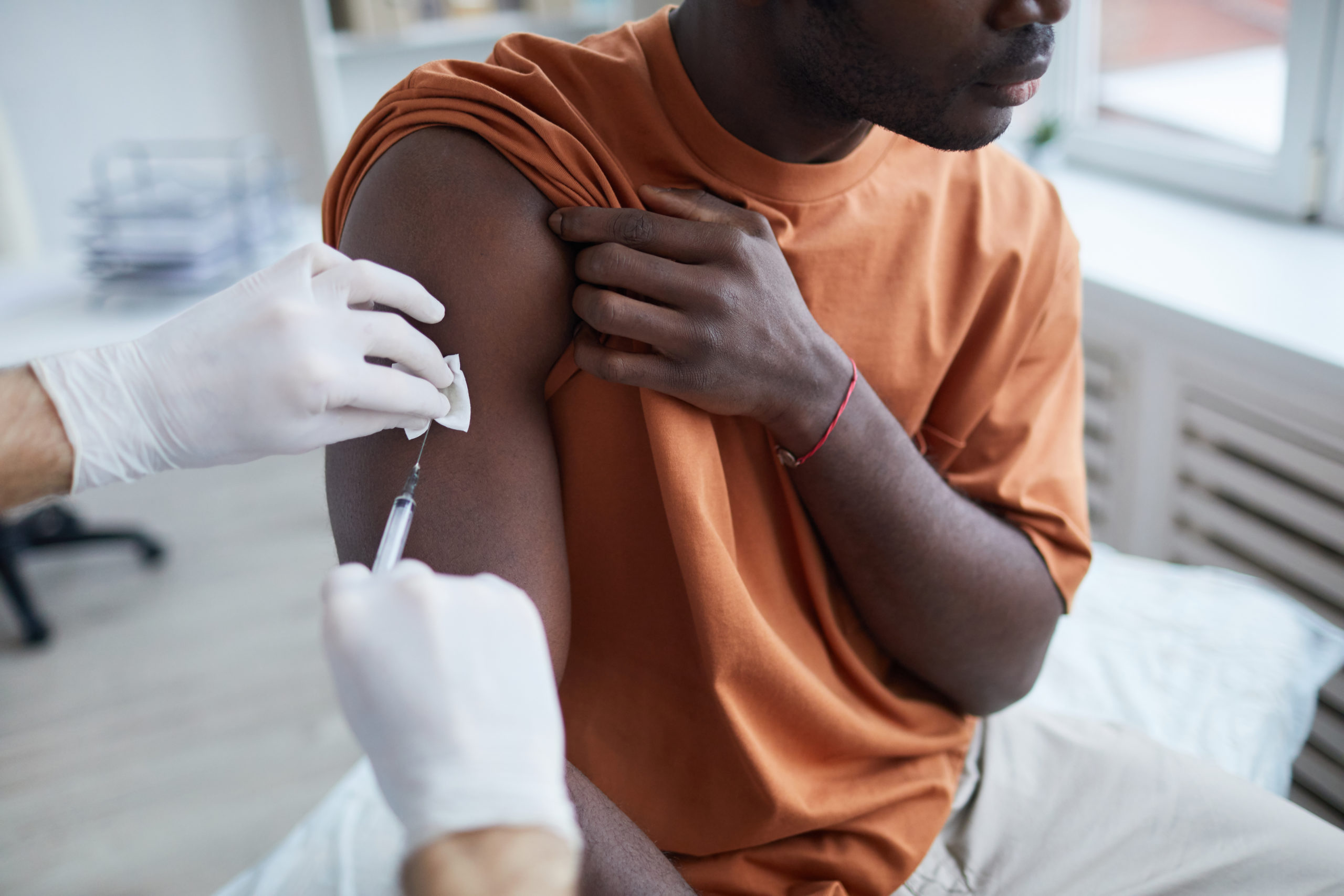 As Los Angeles increases vaccination clinics to reach more people of color, we explore why it came to this.