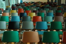College auditorium of empty colorful chairs