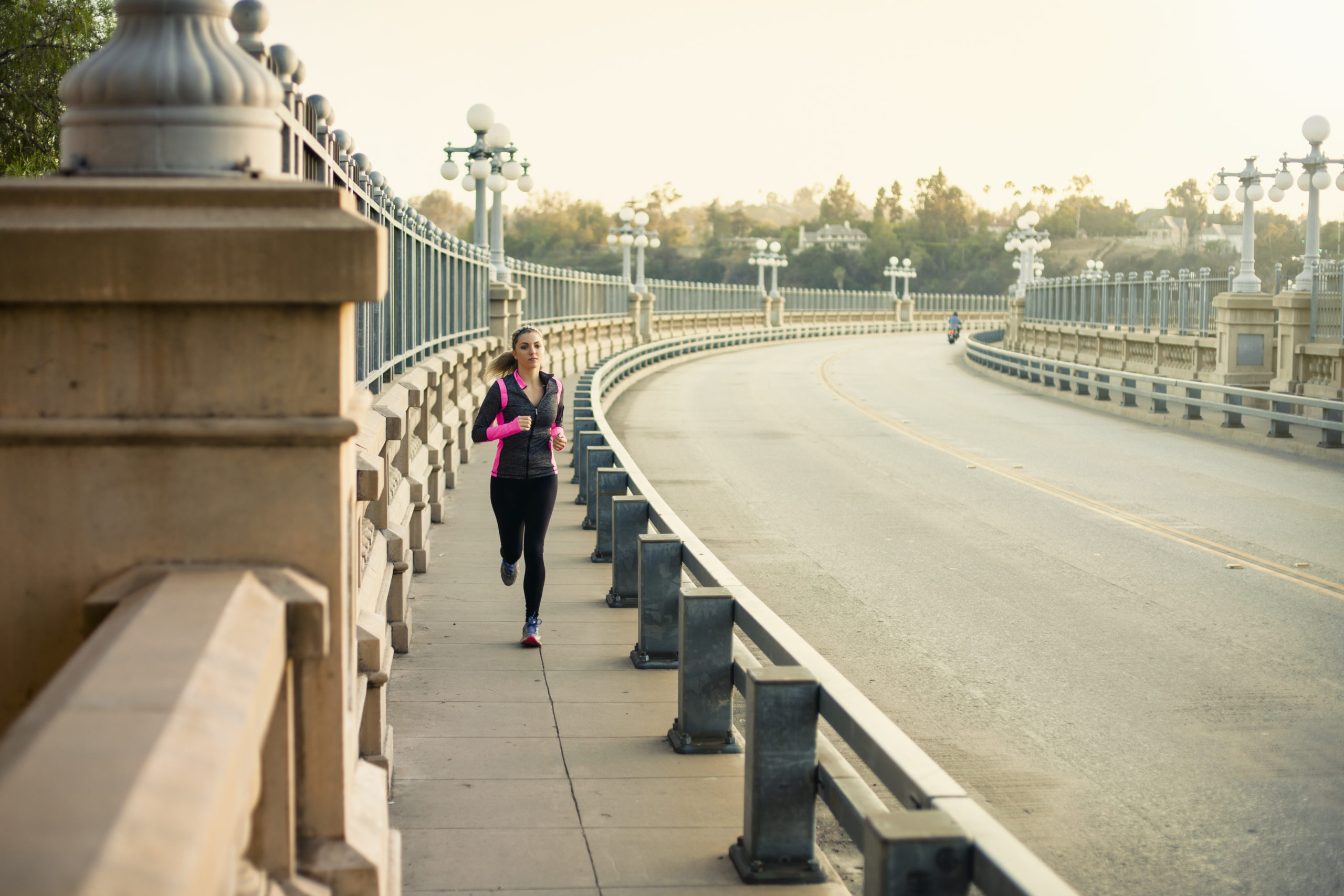 Women jogging on the bridge