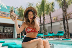 woman posing by las vegas pool hotel