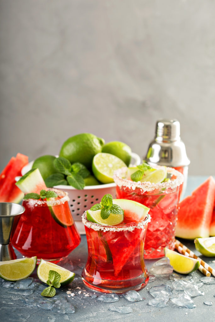 watermelon mint margaritas with shaker, limes, and salt.